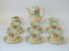 A Clarice Cliff Crocus pattern coffee set