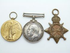 WWI medal trio comprising 14-15 Star named to 1684 Dvr O Creed RFA and War and Victory medals