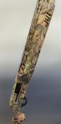 Escort Magnum 10 shot 12 bore semi-automatic shotgun with dipped camouflage paint finish,