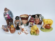 A quantity of ceramics to include Royal Crown Derby duck paperweight, Royal Doulton character jugs,