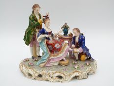 A Dresden figural group of a lady with two suitors,