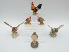 Six Beswick birds comprising mallard, pheasant, two grouse/quail,