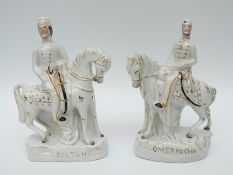 A pair of Staffordshire mounted figures Omer Pasha and Sultan,