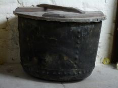 A riveted copper copper with wooden lid,