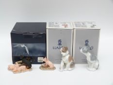 Lladro dog and cat figures,