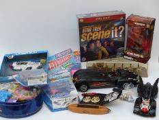A collection of Thunderbirds and sci-fi related toys,