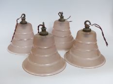 A set of four early 20thC pressed glass lamp shades, 12.