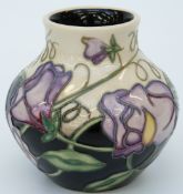 Moorcroft vase of squat form in Day Dream pattern by Sally Tuffin, 8cm tall,