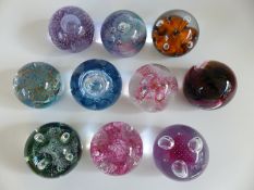 Ten Caithness Glass paperweights Moonflower (orange), Moonflower (green), Quicksilver, Triple Crown,
