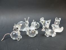 Seven Swarovski Crystal animals comprising snail, two fox cubs, kitten, rabbit, chicken and chick,