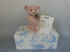 Steiff Teddy Bear Lily-Rose with pale pink mohair, shaved snout, green bow and jointed limbs,