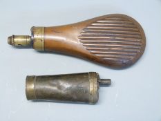 Two copper and brass powder flasks one with reeded decoration, 21cm long,
