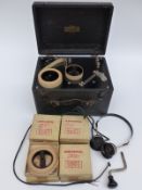 An American Instructograph Morse Code training machine with tapes, handle,