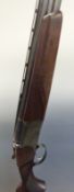 Baikal 27E-IC 12 bore over and under ejector shotgun with chequered grip and forend, engraved lock,