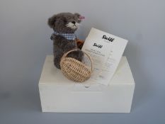 Steiff Teddy Bear Oktoberfest Pretzel Seller with grey mohair, basket, pretzel and jointed limbs,