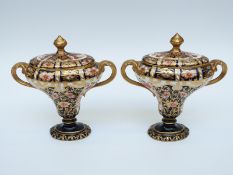 A pair of Royal Crown Derby Imari covered pedestal twin-handled vases/urns with 1326/6299 NF to
