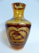 A flash overlaid and cut Bohemian glass vase on an amber ground,