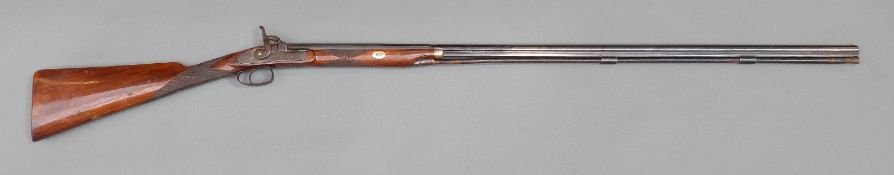 Approximately 40 bore percussion hammer action gun with engraved lock, hammer and trigger guard,