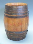 A wooden metal bound gunpowder barrel stamped to one end Powder 50LB CH FG 56,