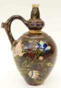 A continental ceramic vase with enamel floral decoration probably Zolnay Pecs