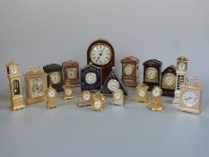 Nineteen miniature clocks including brass examples, bracket clocks,