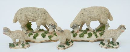 A group of 19thC Derby style sheep and lamb figures