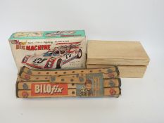 Bilofix Construction Kit together with a non-fall battery operated car and a children's microscope,