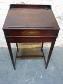 A 19thC mahogany clerk's or similar desk W58 x D46 x H92cm