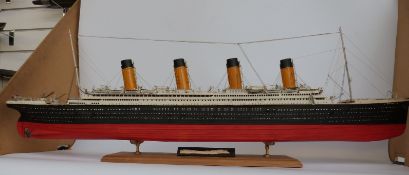 Kit built model of the Titanic ship on wooden plinth with name plaque,