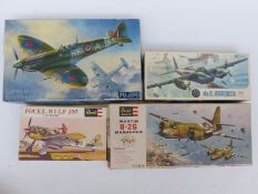 Four Airfix, Revell and Fujimi model aeroplane kits including Super Marine Spitfire MK-V,