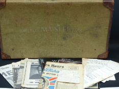 A vintage leather bound suitcase with Surg Lt Cdr M.A.