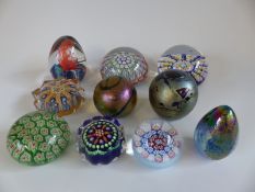 A collection of millefiori and iridescent paperweights including John Deacons Bull, Strathearn,