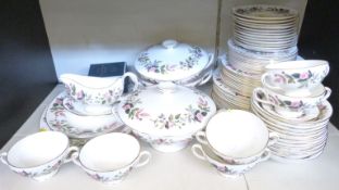 A quantity of Wedgwood Hathaway Rose pattern dinnerware, mostly 12 place settings with extras,