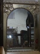 A gilt framed arch top mirror,