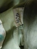 WWII US field jacket in 1943 pattern with hand painted motif on back, possibly flying tigers,