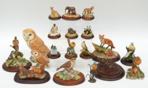 A collection of Border Fine Arts and Beswick figures of birds and animals