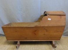 A 19thC pine cradle or crib