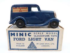 Tri-ang Minic clockwork tinplate Ford Light Van with blue body, gilt transfers and key,