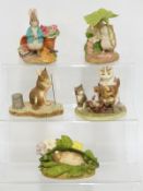 Five Border Fine Arts Beatrix Potter figures in tins