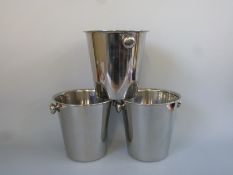 Three stainless steel champagne ice buckets