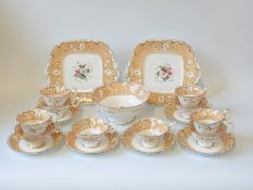 A Rockingham or similar Victorian hand-painted part tea service