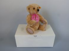 Steiff Original Teddy Bear Jona with blonde mohair, pink ribbon, shaved snout and jointed limbs,