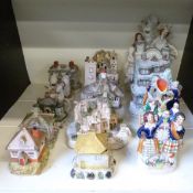 A collection of Staffordshire including spill vases, flatbacks and pastille burners,