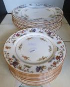A quantity of Royal Worcester dinner and tea plates with Chinese style decoration