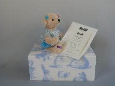 Steiff for Liberty teddy bear Isabel with vanilla mohair, blue floral dress and jointed limbs, UK,