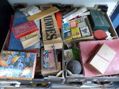 A collection of vintage playing cards and games including a boxwood chess set, dominoes,