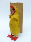 Clockwork tinplate chick with golden fur and foot stamped 'Foreign' in part original box stamped