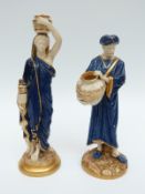 A pair of Royal Worcester figures of water carriers with puce back stamps,