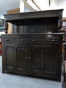 An oak court cupboard W125 x D46 x H128cm