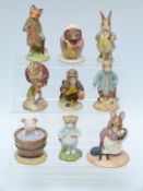 Nine Beswick Beatrix Potter figures including Mr Jeremy Fisher Digging, Yock-Yock in the Tub,